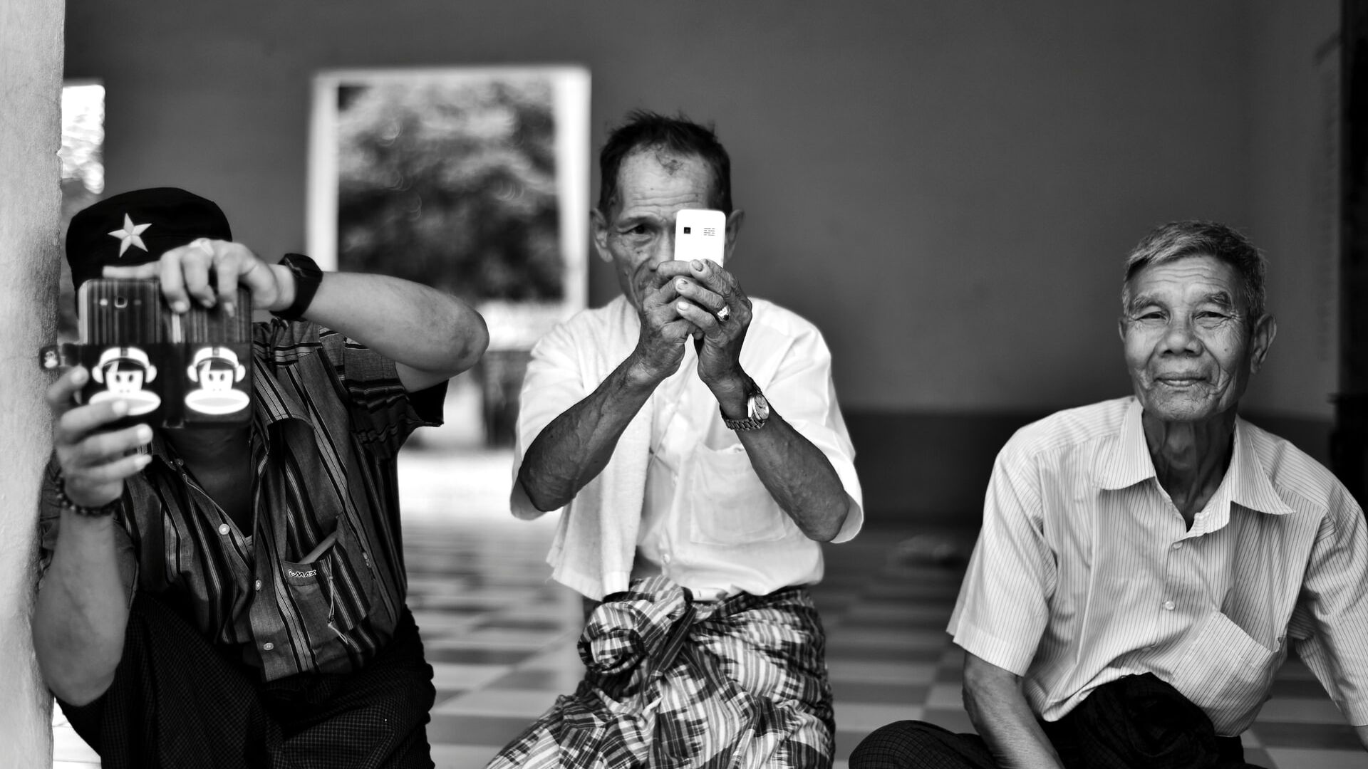 Phone users in Mandalay, Myanmar