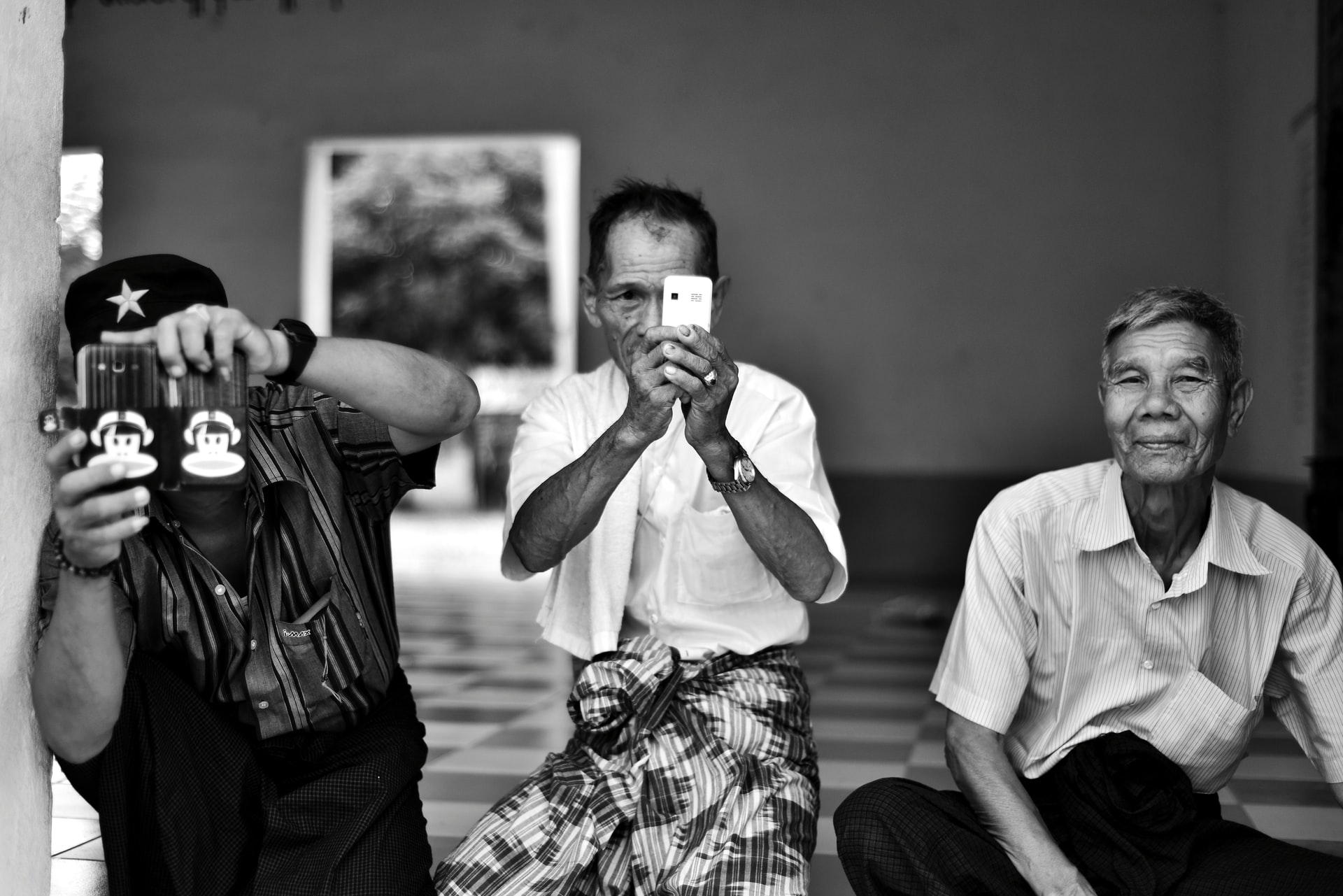 Phone users in Mandalay, Myanmar