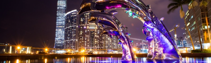 Low Angle Photography of Dolphin on Fountain
