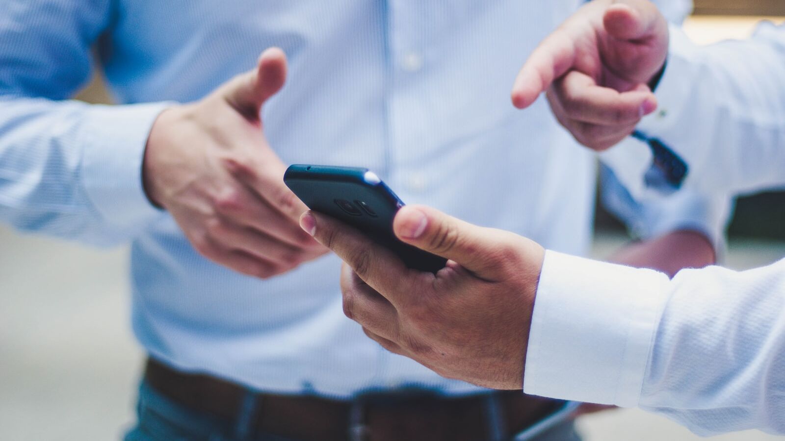 person holding black smartphone