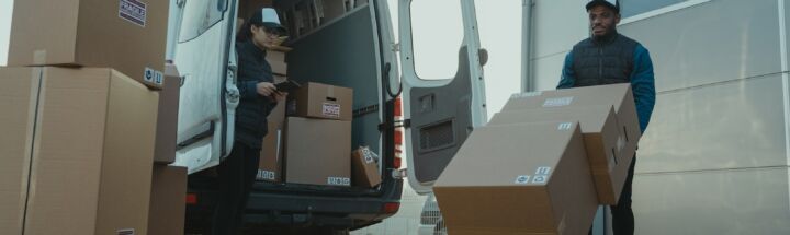A Man and a Woman Working for a Delivery Company