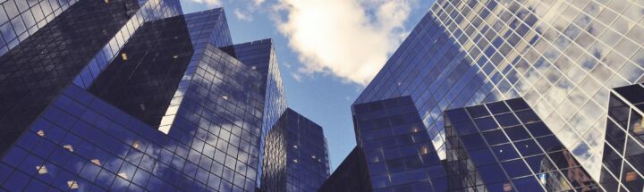low angle photo of curtain wall building