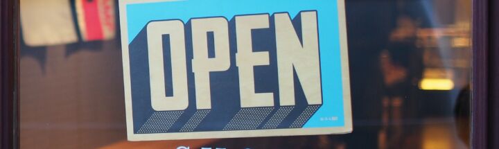 gray and blue Open signage