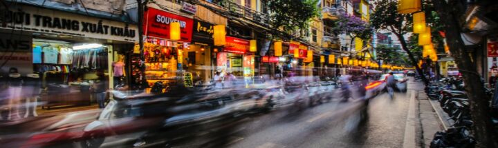 time lapse photography of vehicle towards pedestrian lane