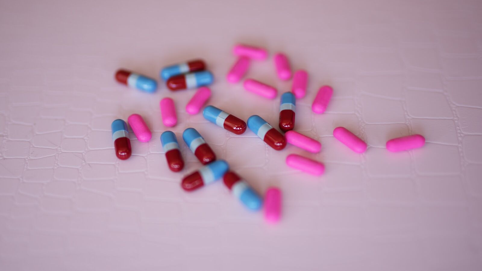 capsules on white panel