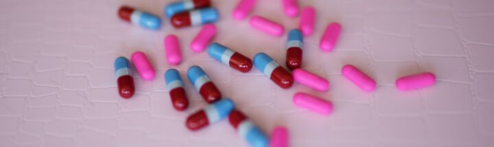 capsules on white panel