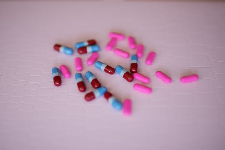 capsules on white panel