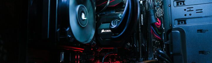 turned-on black and red computer tower