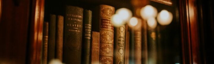 books in glass bookcase