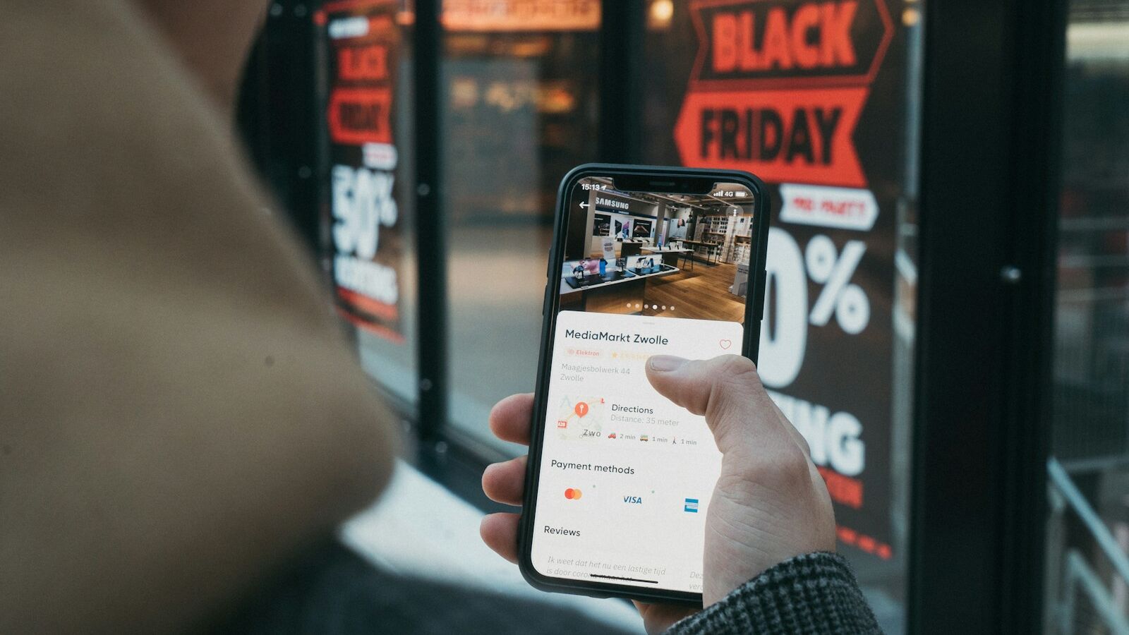 person holding black samsung android smartphone