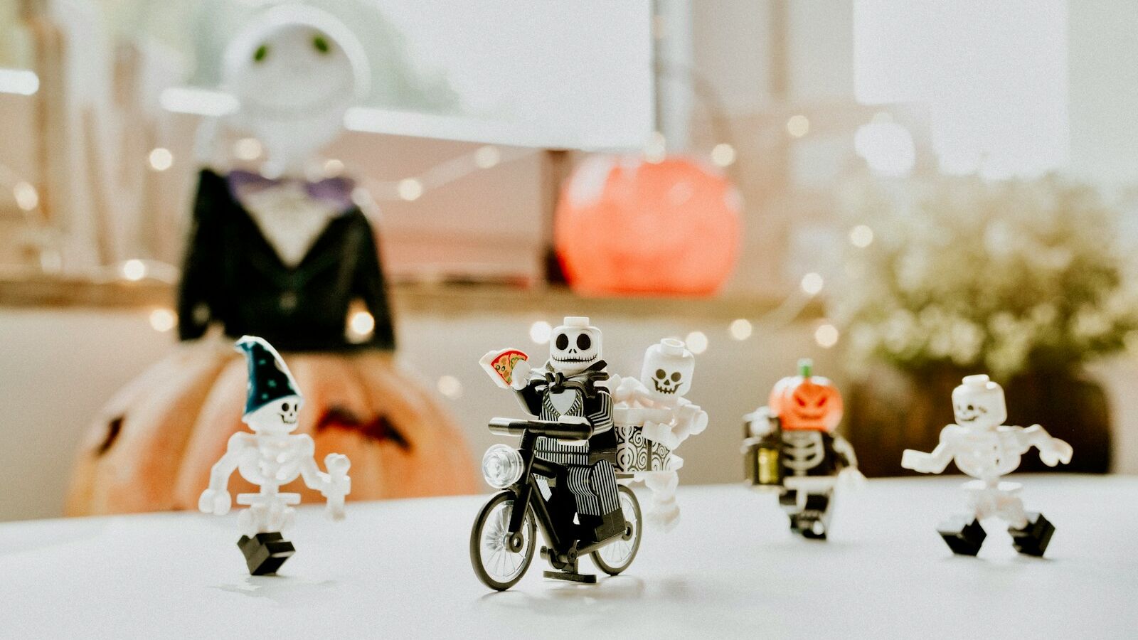 a group of small toy figurines sitting on top of a table