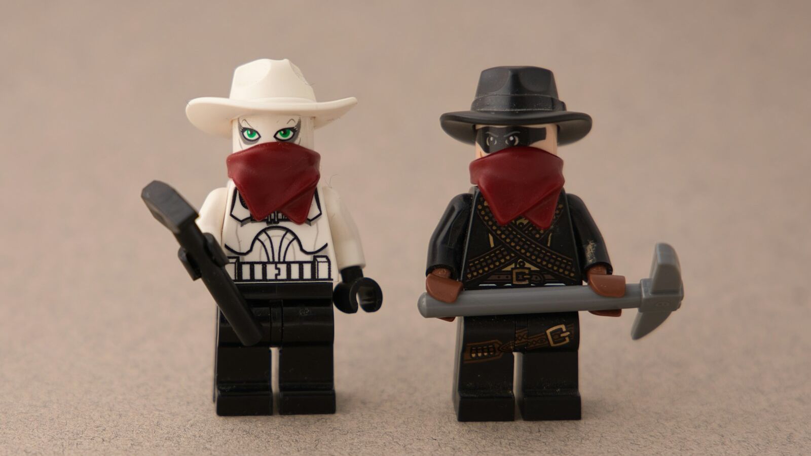 a couple of legos that are standing next to each other
