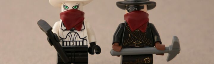 a couple of legos that are standing next to each other