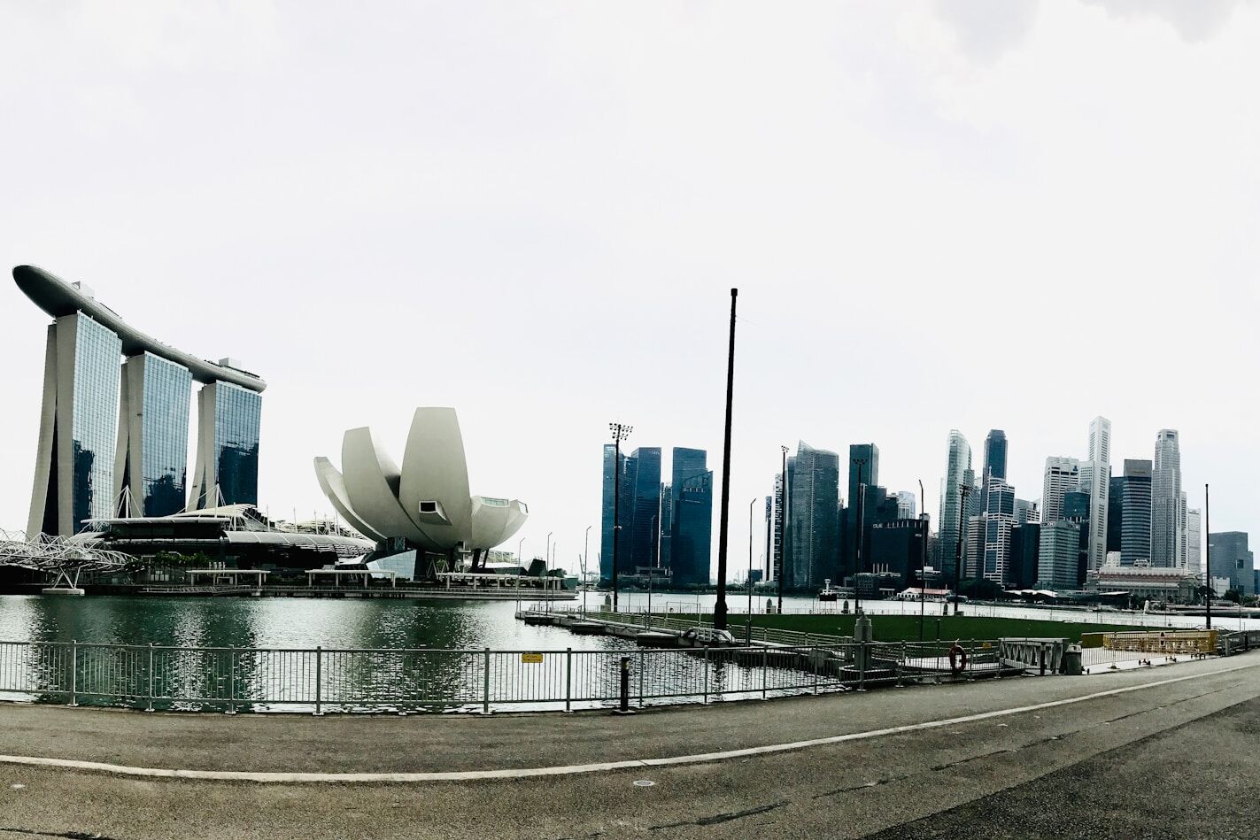 a large body of water with a city in the background