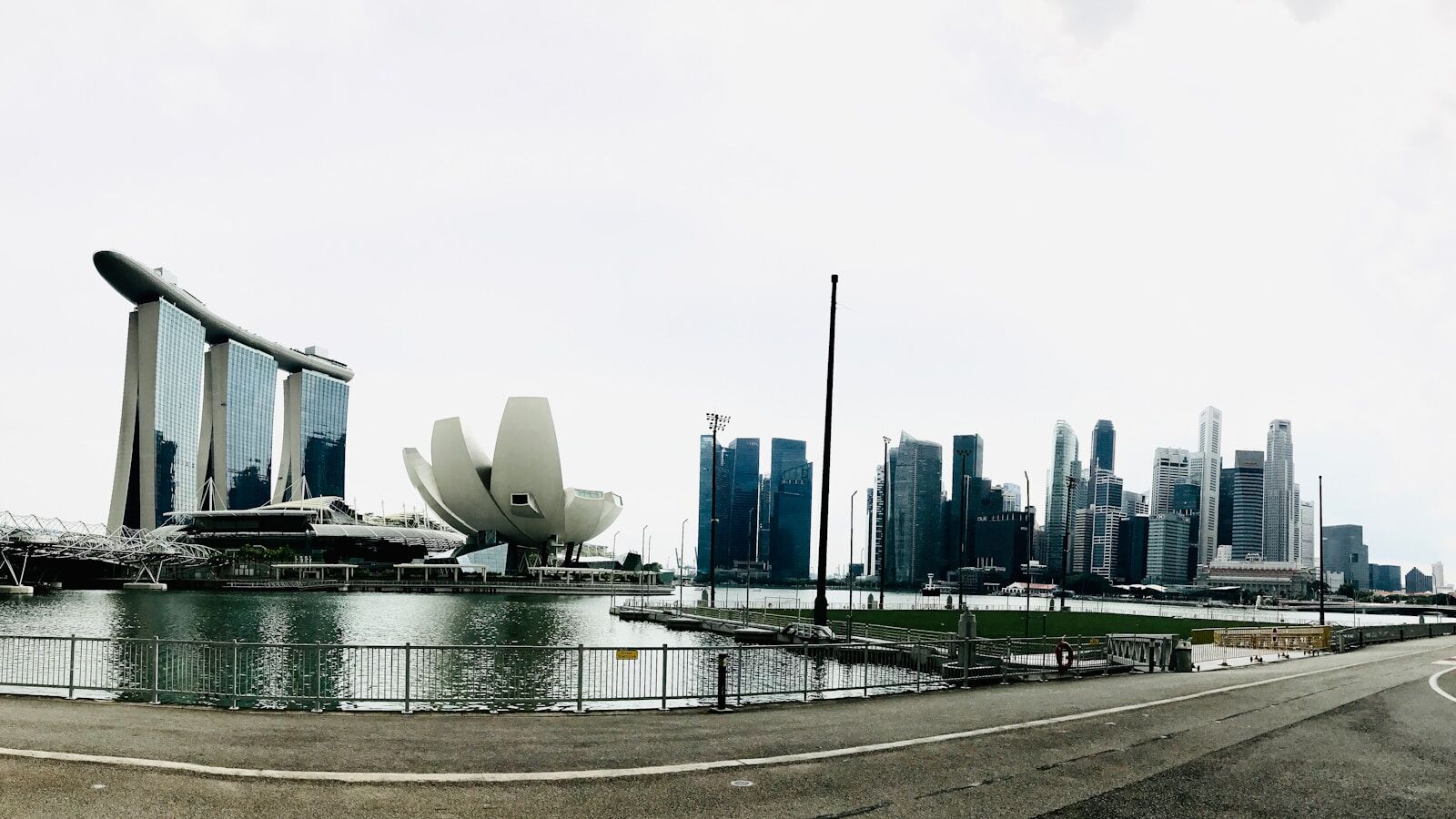a large body of water with a city in the background