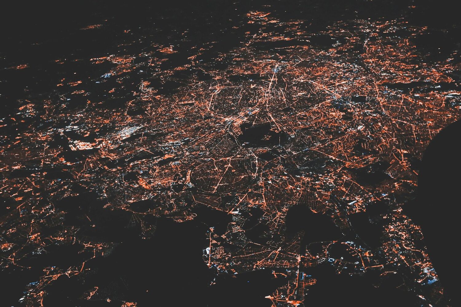 lighted city at night aerial photo