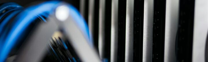 a close up of a bunch of wires in a rack