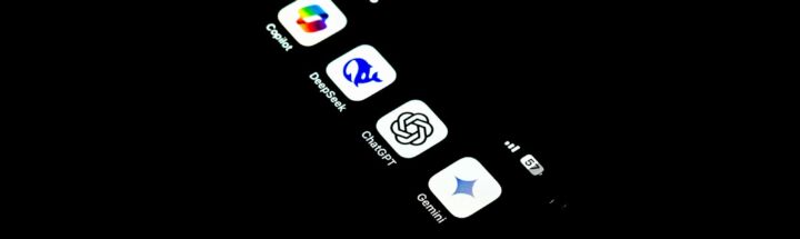 A cell phone that is lit up in the dark