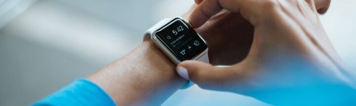person clicking Apple Watch smartwatch