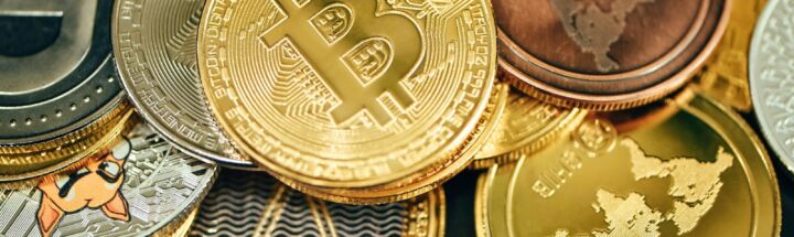 a pile of gold and silver bitcoins