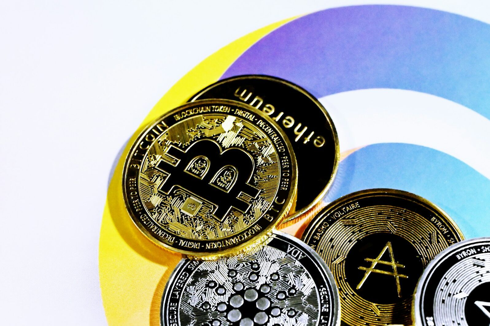 a pile of bitcoins sitting on top of each other