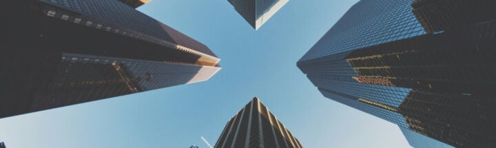 blue and black city buildings photography