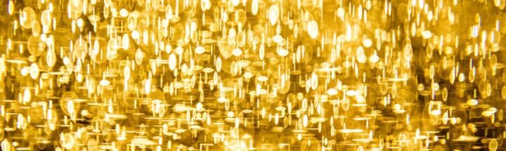 a yellow background with lots of small circles