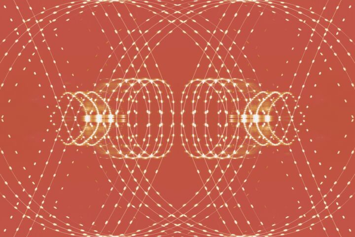 a red background with circles and dots