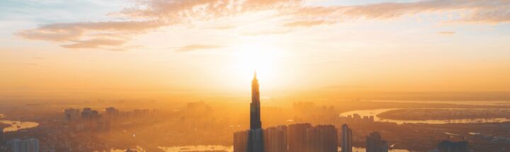 city skyline during sunset with cloudy sky