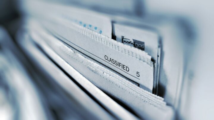 Classified page 5 newspaper selective focus photography
