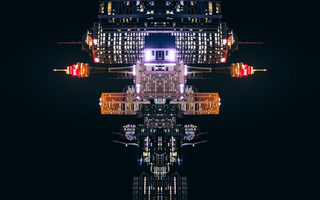 a reflection of a building in the water