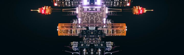 a reflection of a building in the water