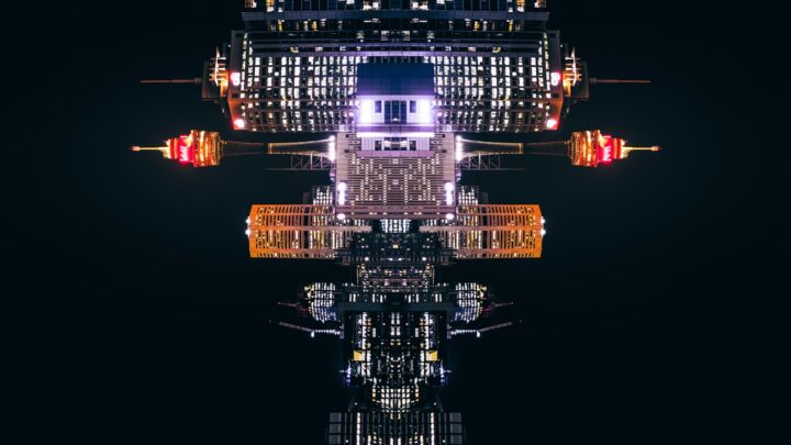 a reflection of a building in the water