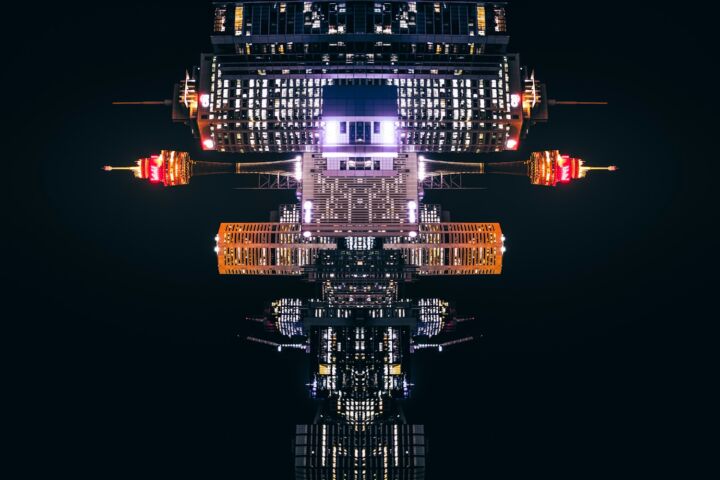 a reflection of a building in the water