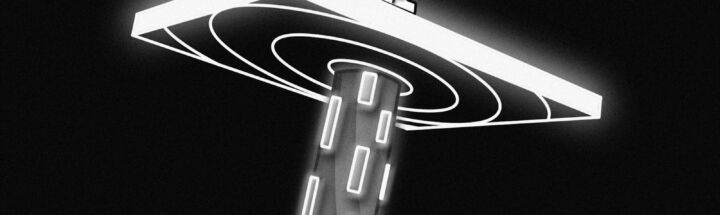 a black and white photo of a street light
