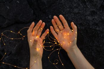persons left hand with silver ring