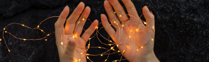 persons left hand with silver ring