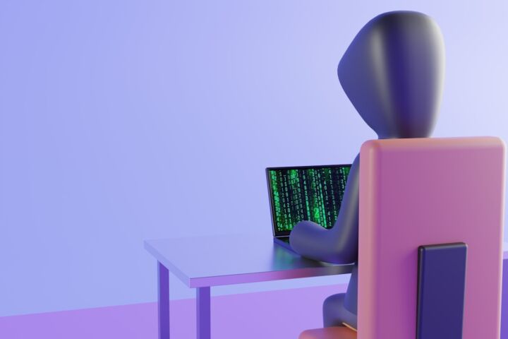 a few chairs with a table and a computer