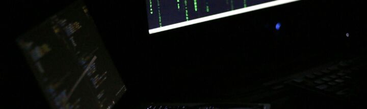 A laptop computer sitting on top of a desk