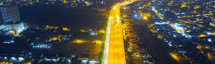city with high rise buildings during night time