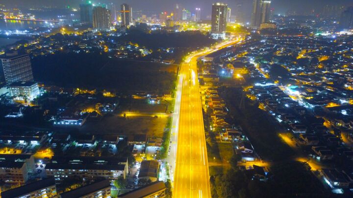 city with high rise buildings during night time