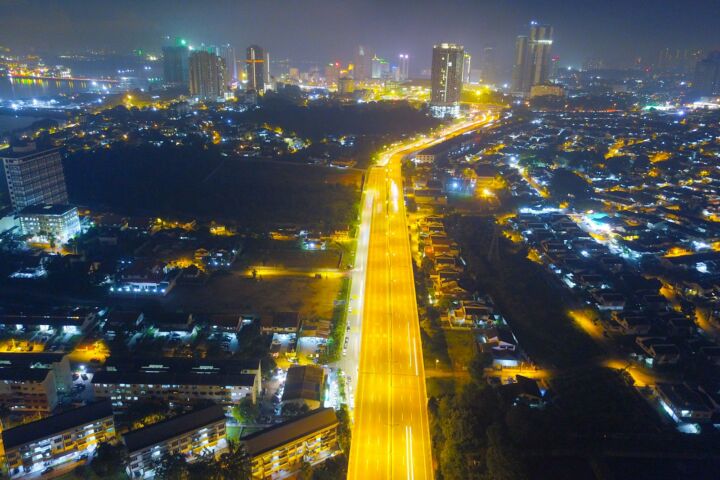 city with high rise buildings during night time