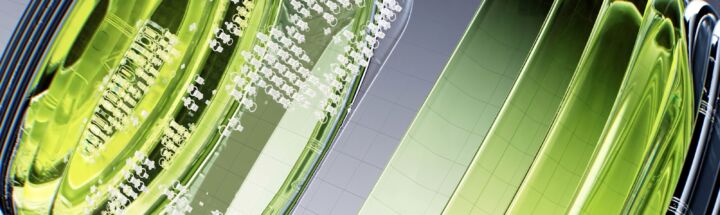 a close up of a green object on a white surface