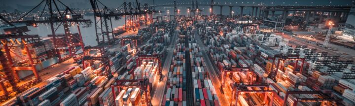 city with high rise buildings during night time