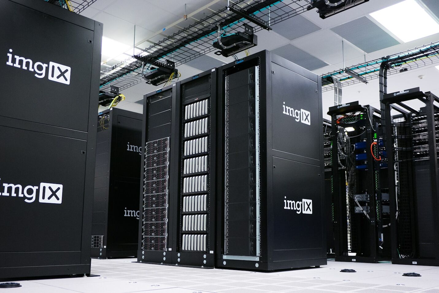 img IX mining rig inside white and gray room