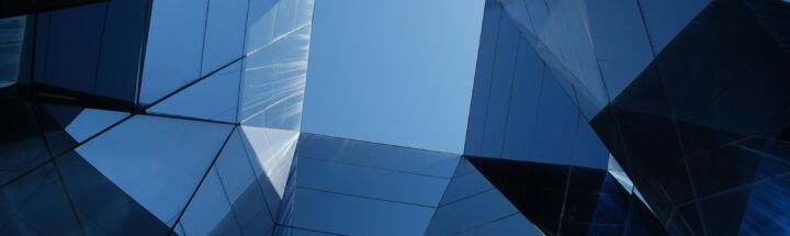 low angle photo of curtain wall building