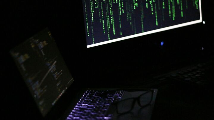 A laptop computer sitting on top of a desk