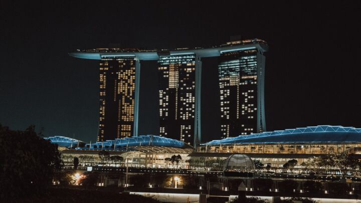 a night view of a city with tall buildings