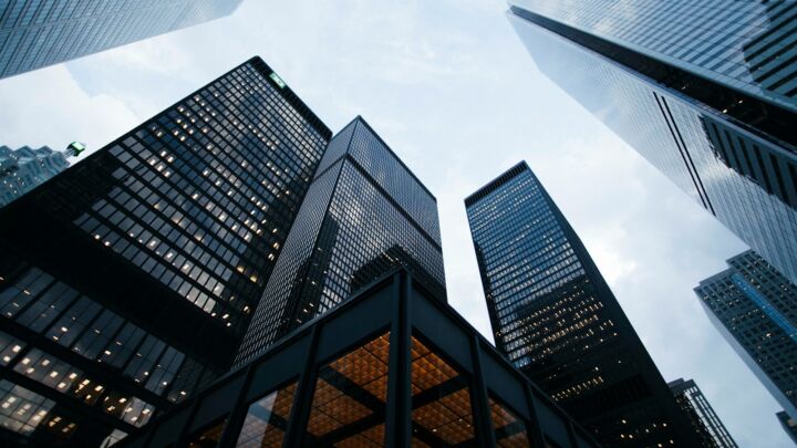 low angle photo of city high rise buildings during daytime
