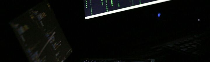 A laptop computer sitting on top of a desk